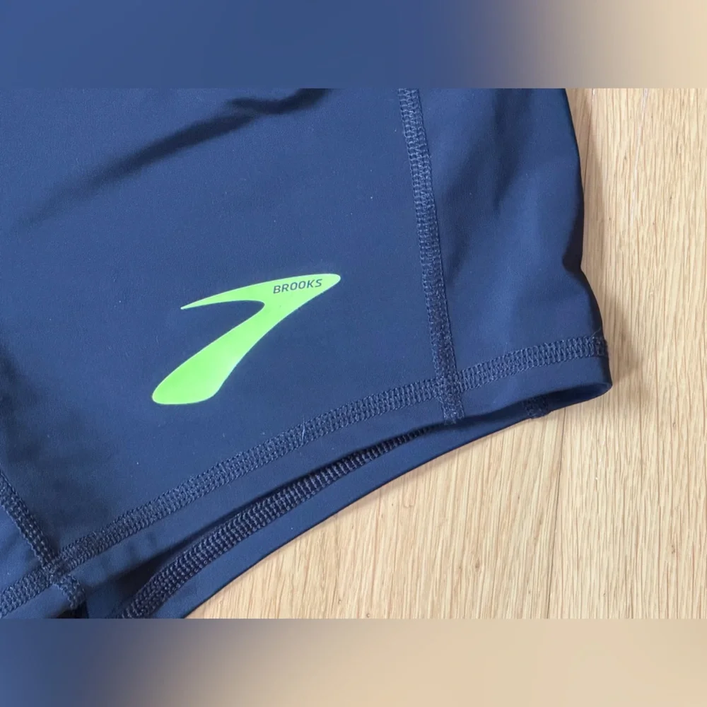 Brooks Navy Blue Compression Running Shorts with Neon Green Logo